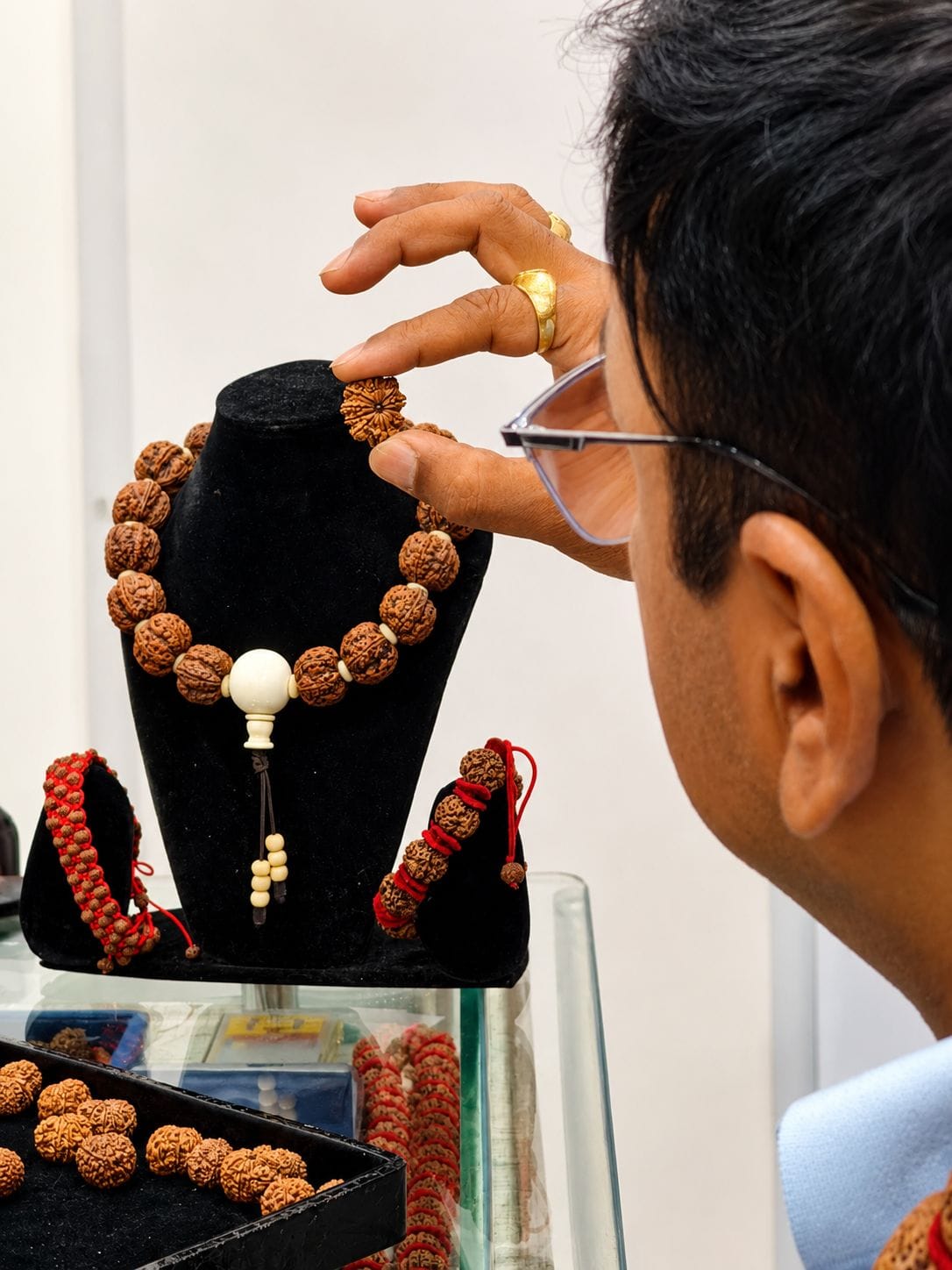 Bala Rudraksha team inspecting Rudraksha beads